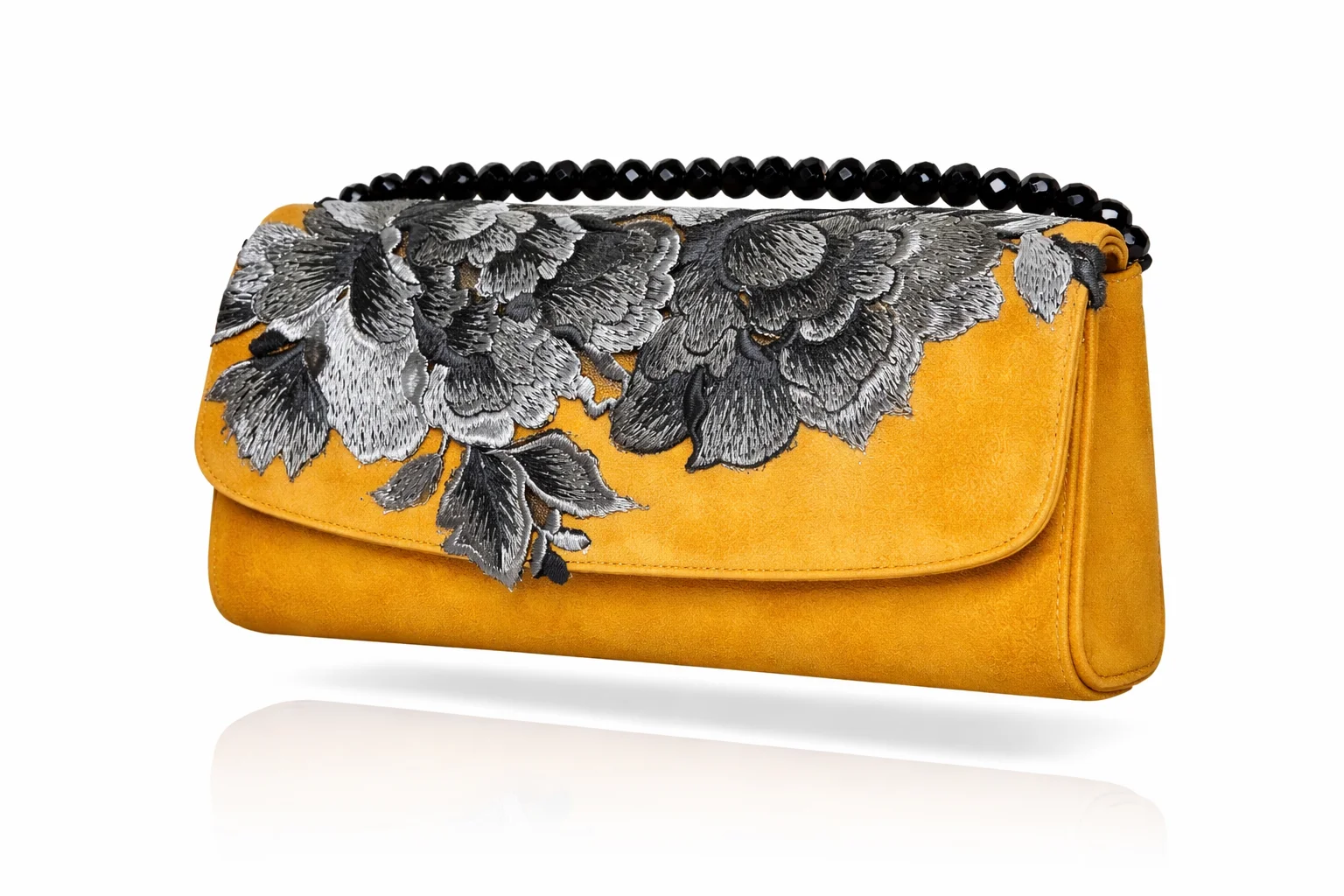 clutch mostaza bordado plata