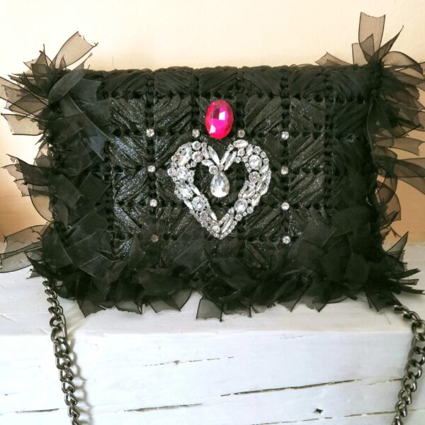 Bolso negro bandolera de fiesta