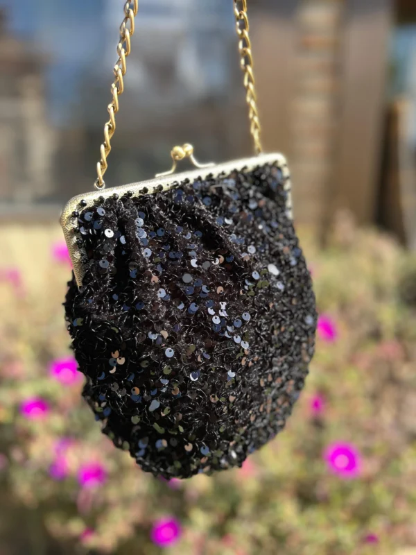 bolso bombonera de lentejuelas negras