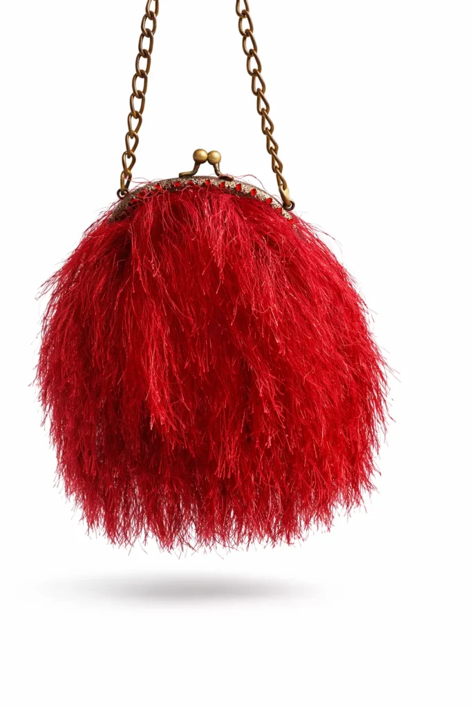 bolso bombonera con flecos rojos